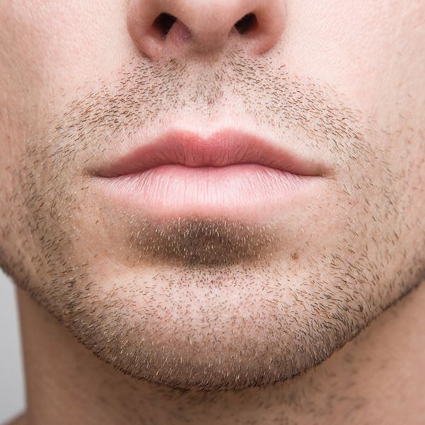 Close up of man's chin and lips