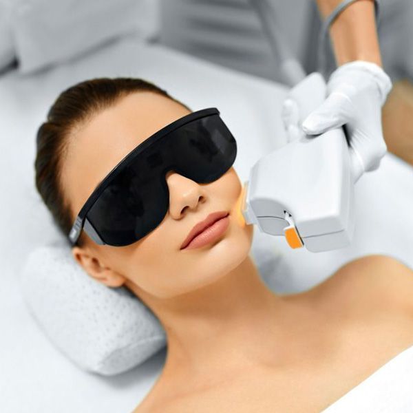 Woman undergoing laser treatment