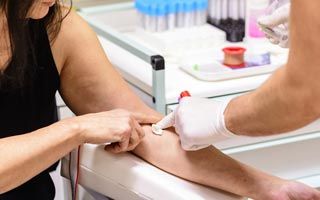 Woman getting blood drawn