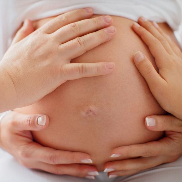 Closeup of pregnant belly
