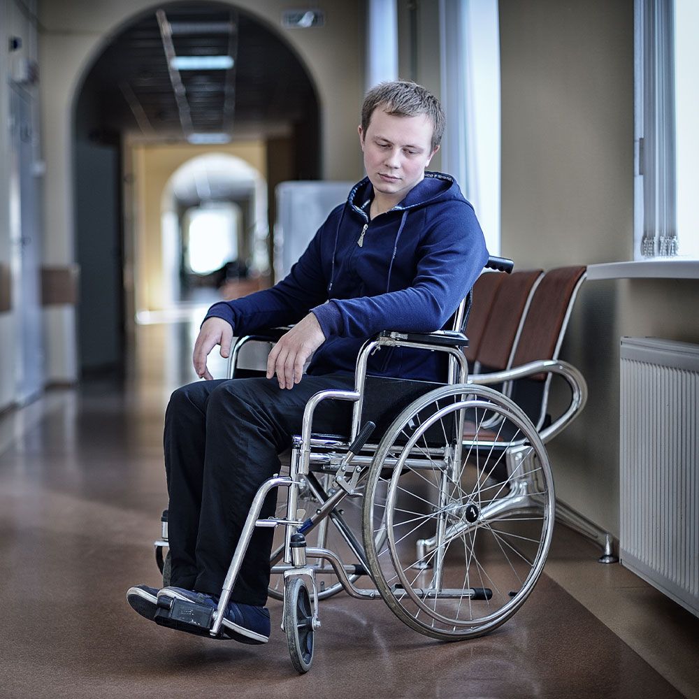 Sad man in wheelchair