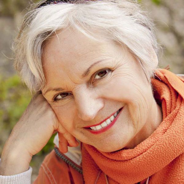 Elderly woman smiling with dentures