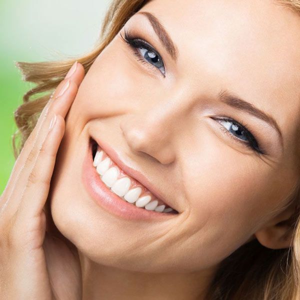 woman with porcelain veneers