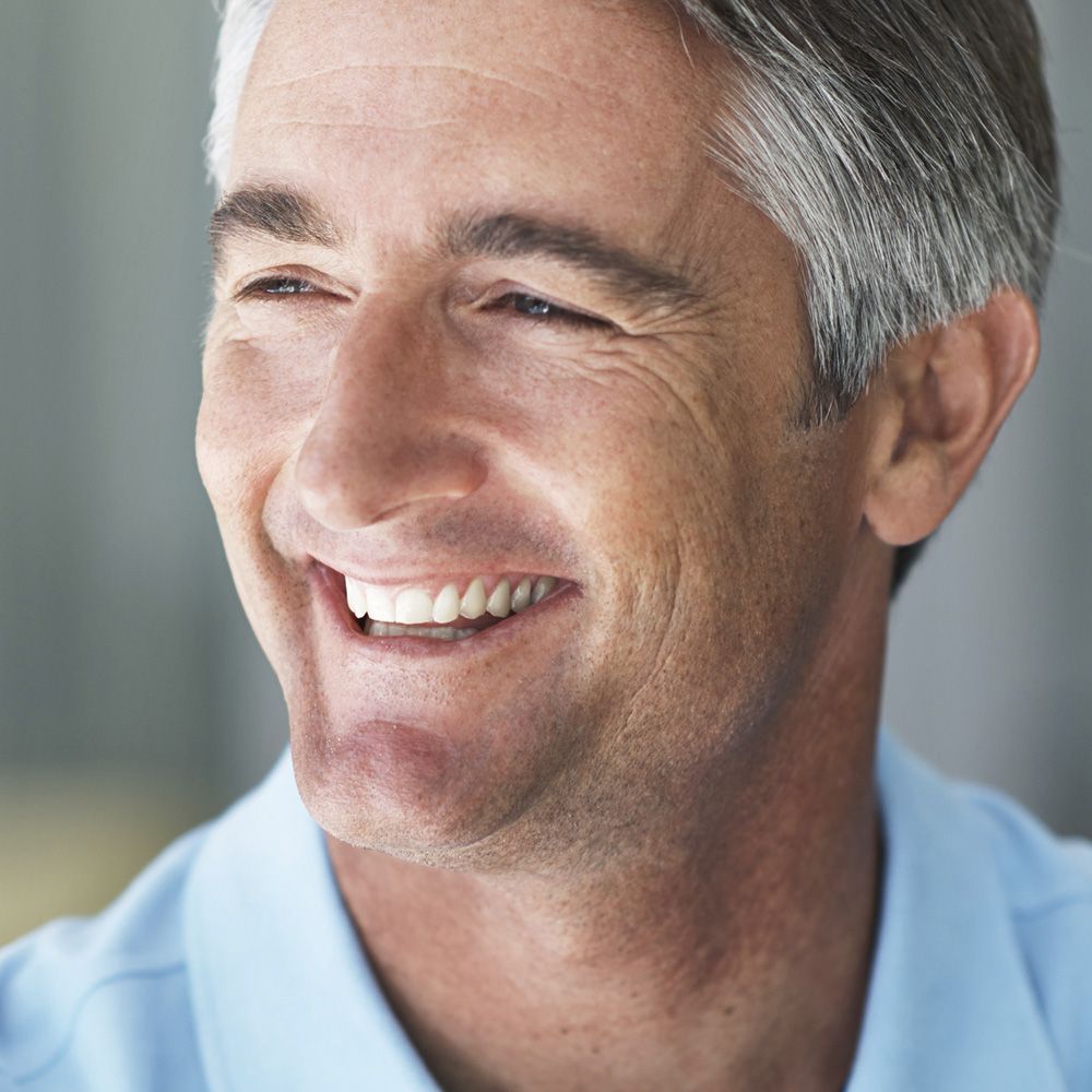 An laughing older man