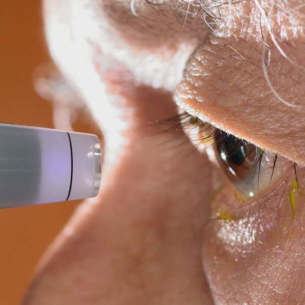 Patient taking tonometry test