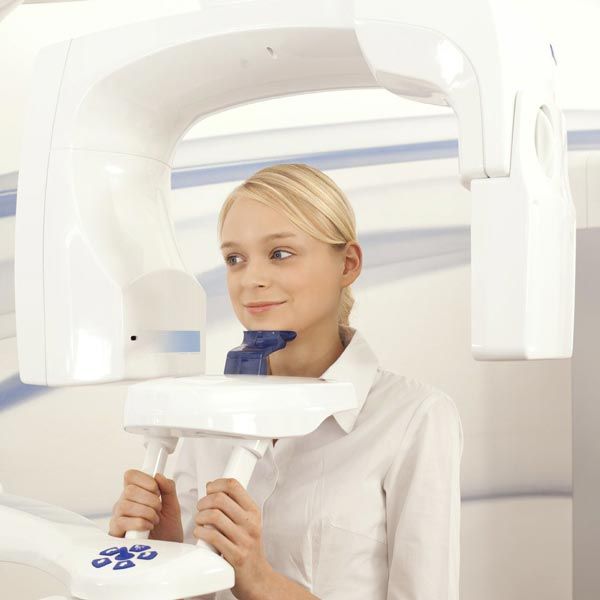 woman in a cone beam scanner