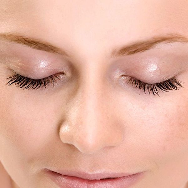 A woman's closed eyelids