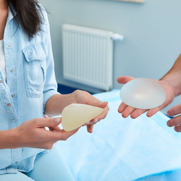 A woman looking at breast implant options