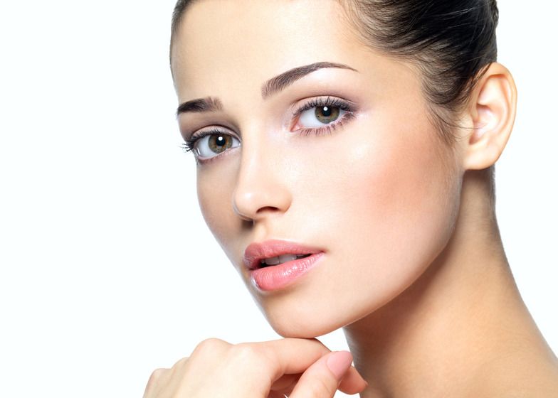image of woman with chin, cheek, and lip augmentation