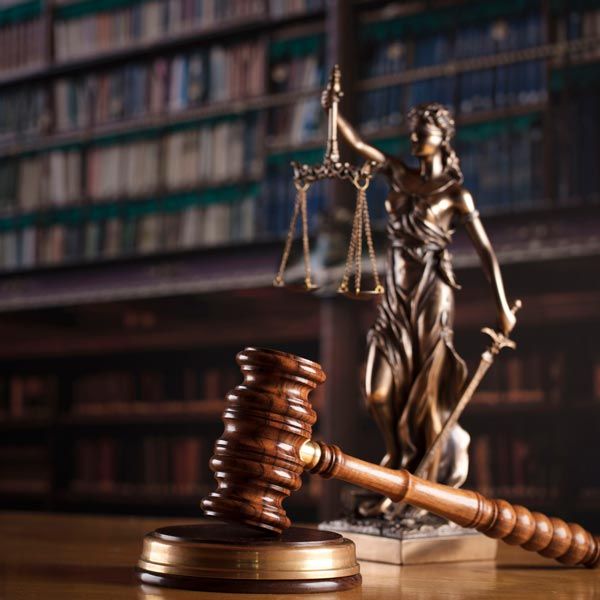 Lady liberty statue and gavel