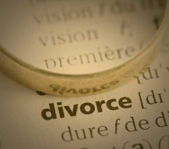 Ring on top of divorce papers