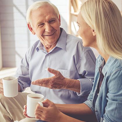 Couple talking over coffee