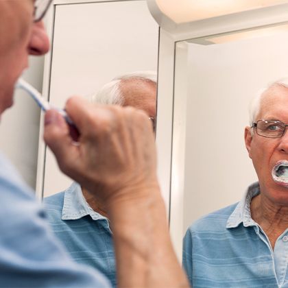 Man brushing teeth