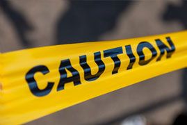 Close-up of yellow 'caution' tape