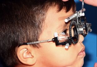 Little boy having his vision evaluated