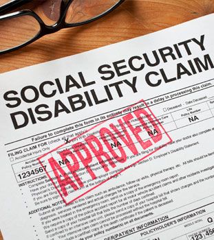 Social Security Disability Claim form with a red 'approved' stamp