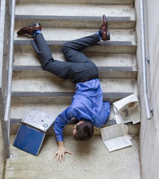 Photo of a man falling down the stairs