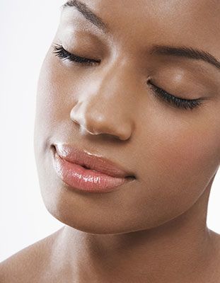 Woman relaxing with eyes closed