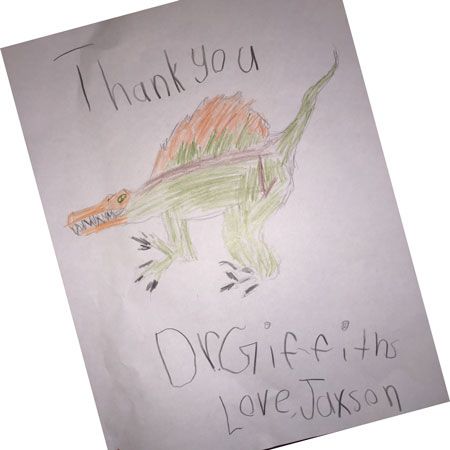 Child drawing of dinosaur with thank you