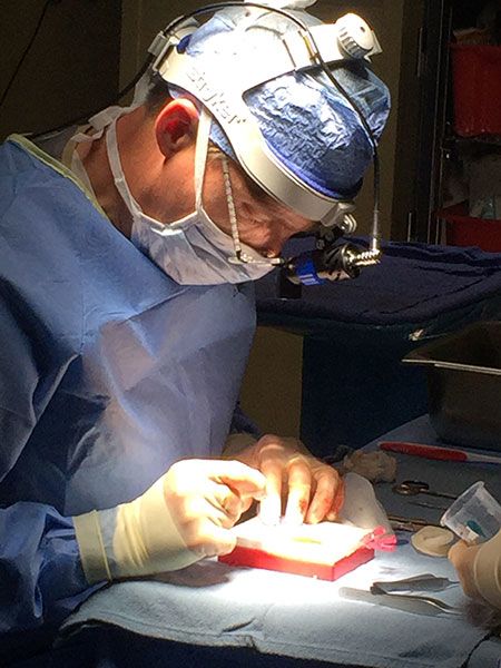 Dr. Griffits in scrubs during operation