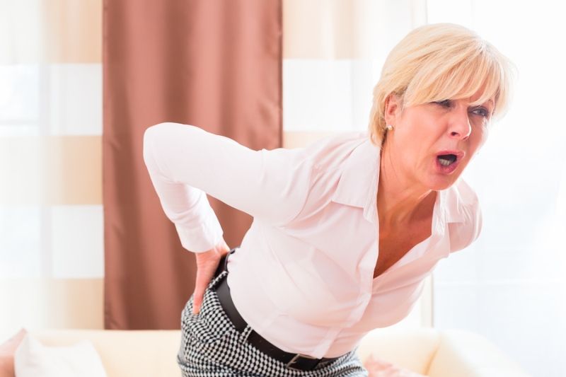 woman suffering from back pain