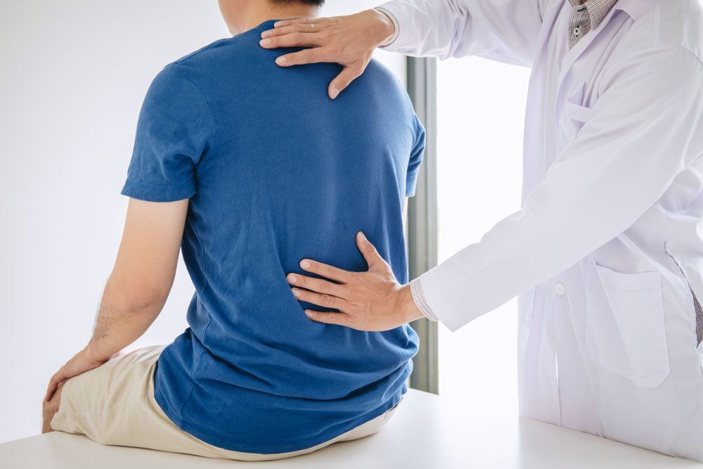 Doctor conducting physical exam