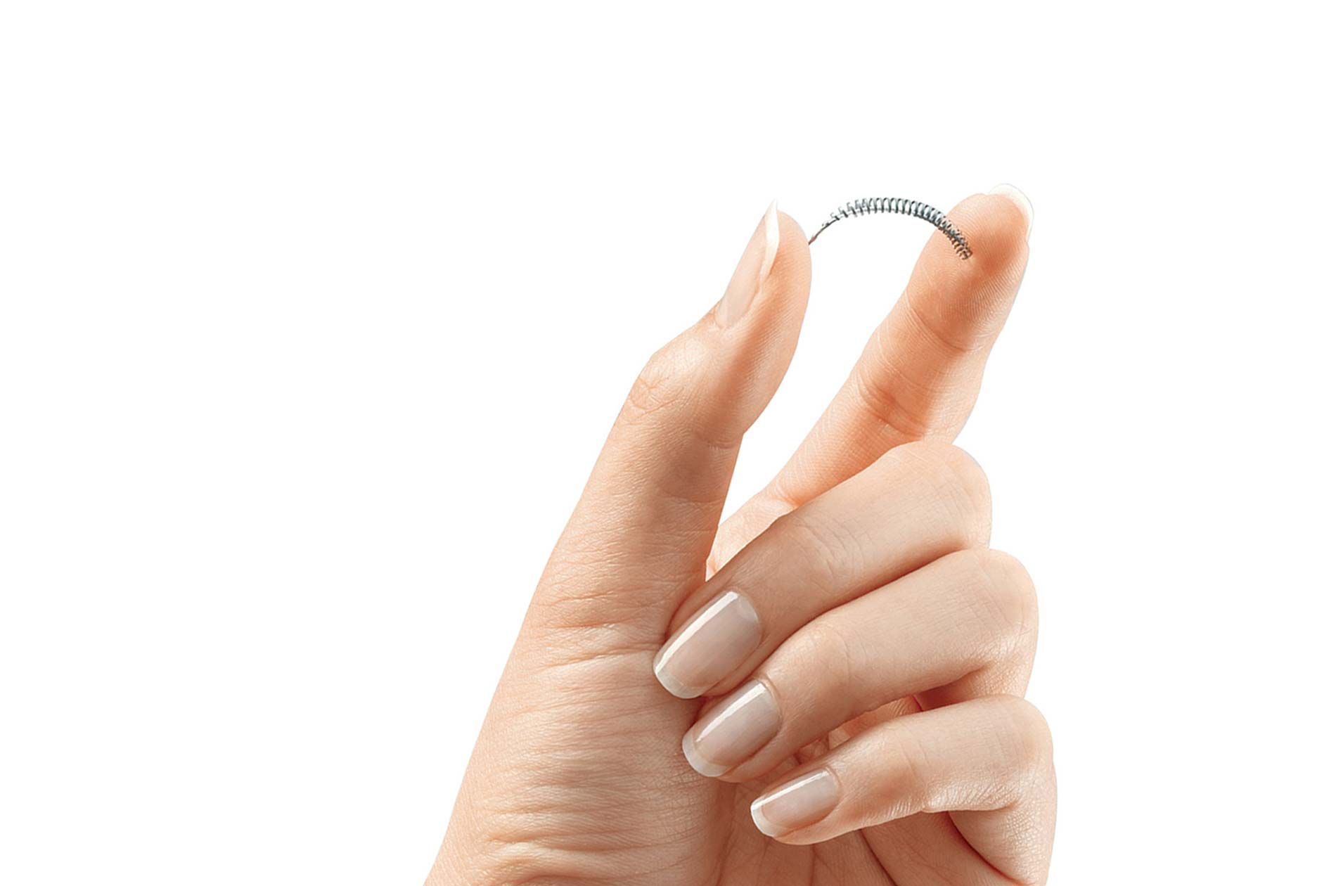 Patient holding an Essure coil