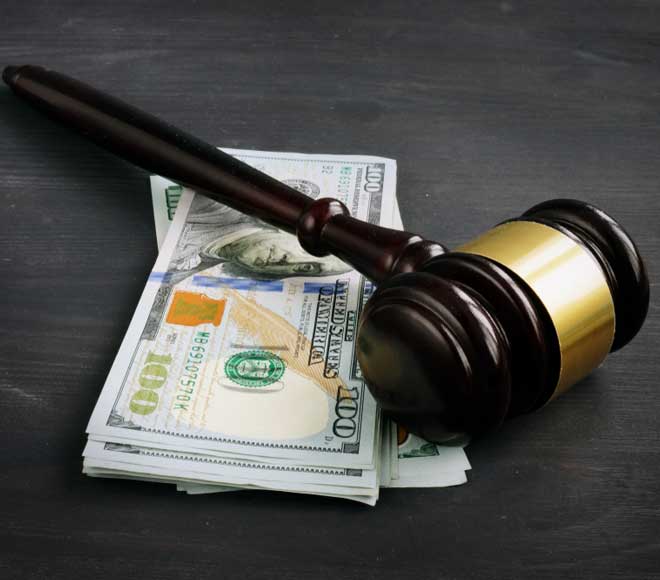 Gavel and hundred-dollar bills
