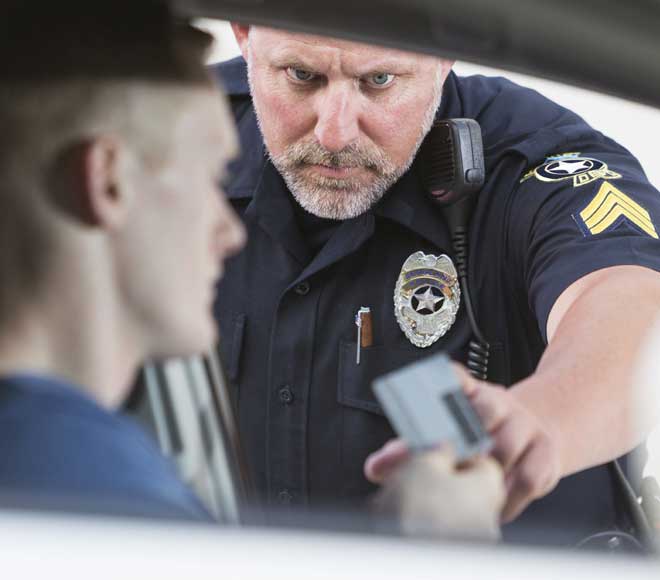 Cop talking to driver