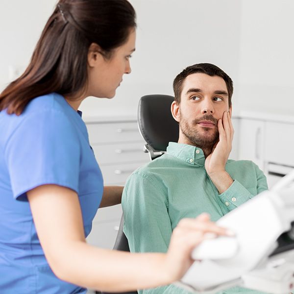 A man at a dental exam